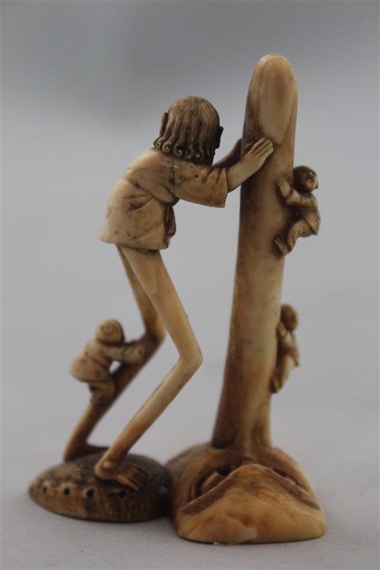 A Japanese ivory netsuke of Ashinaga holding the nose of a Tengu mask, Edo period, 6.9cm